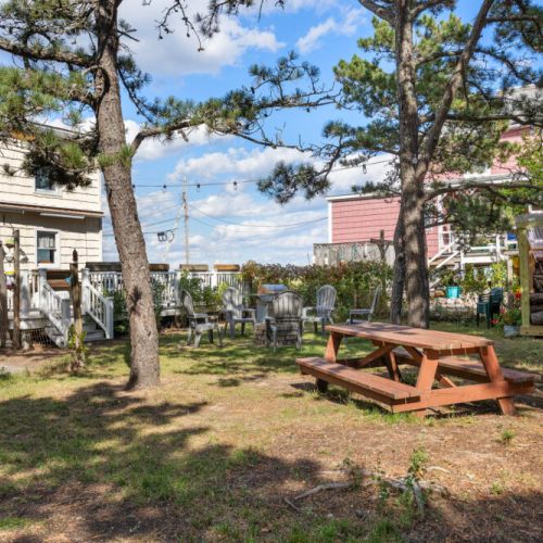 Backyard with firepit and picnic table