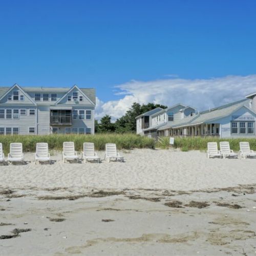 Private beach with lounge chairs for guest use