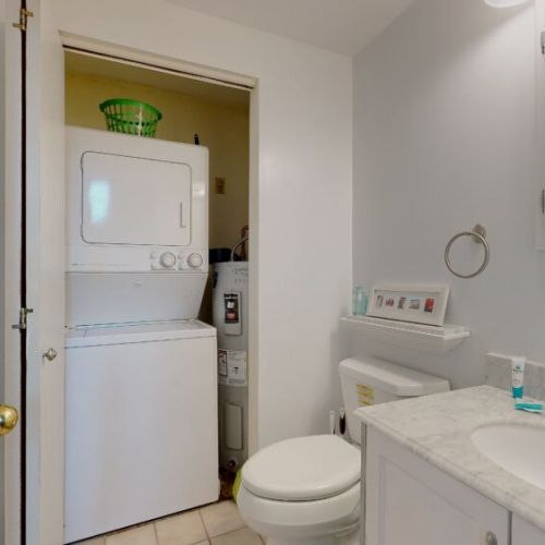 1/2 bath on 1st floor| stacked washer and dryer