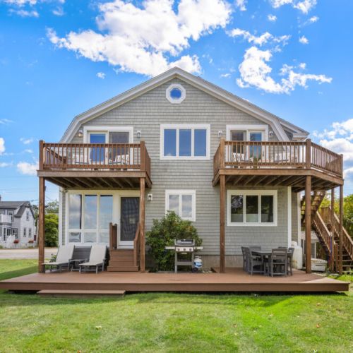 Back view of home | patio | balconies