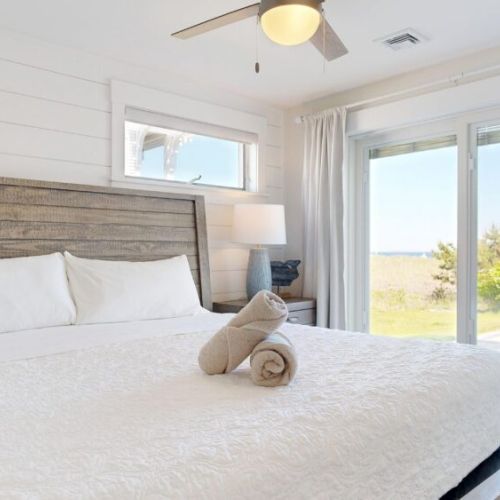 King bed | primary bedroom | patio access