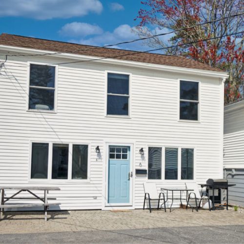 Street view of home| picnic table | grill | parking for two