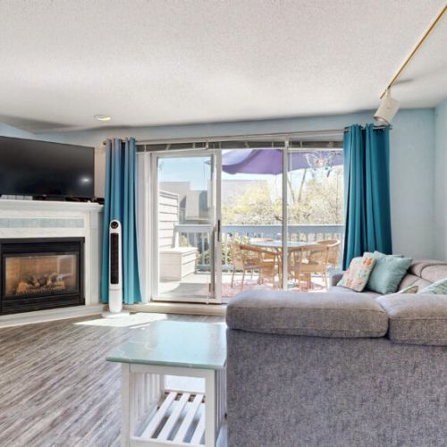 Spacious living area with access to deck