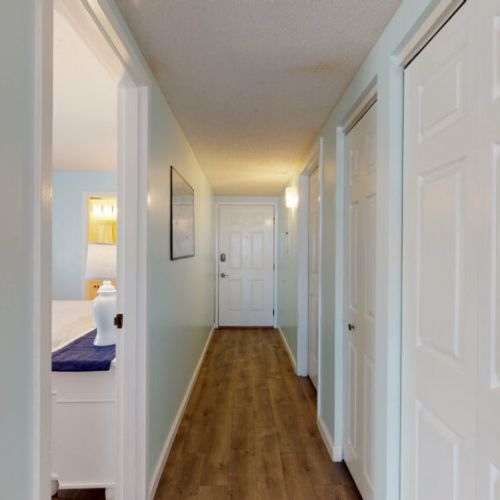 Hallway in vacation home | washer and dryer in closet