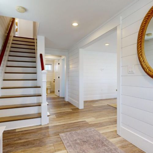 Stairs to main level (2nd floor) from entry way