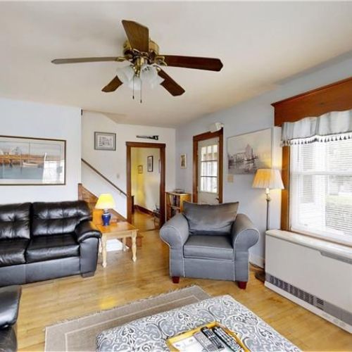 Living room | plenty of seating | ceiling fan